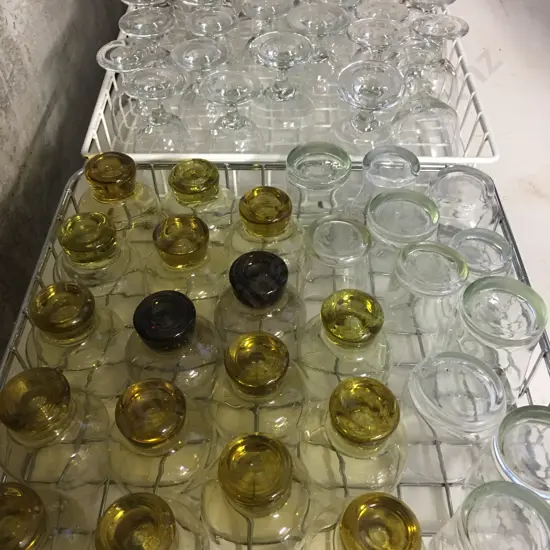 Selection Of Glasses In Wire Trays