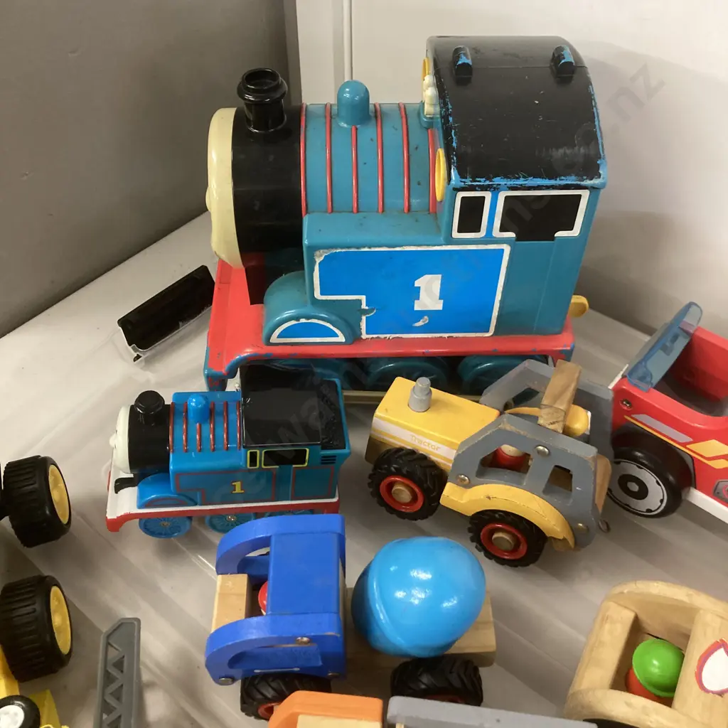 Assorted Toys In Clear Lidded Bin Image 1++