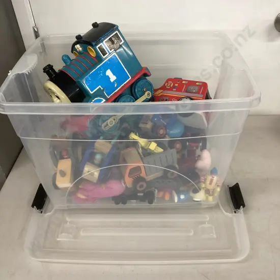 Assorted Toys In Clear Lidded Bin