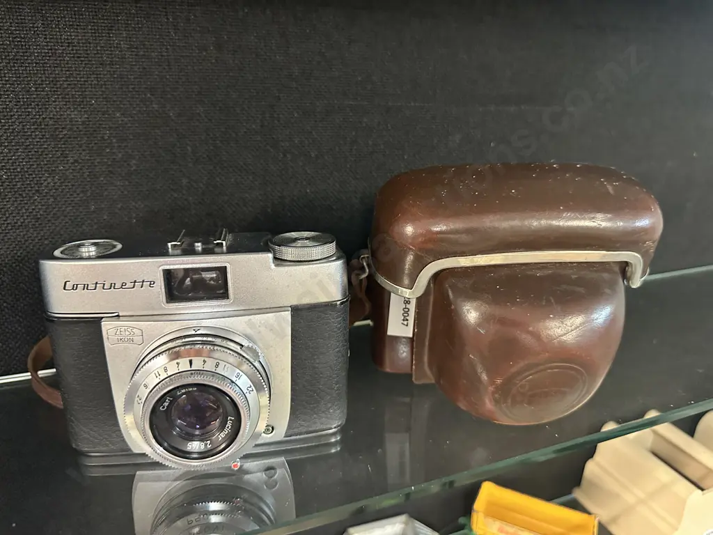 Zeiss Ikon Continette With a Carl Zeiss Lucinar 45mm f/2.8 lens, Brown Leather Fitted Case Image 1++
