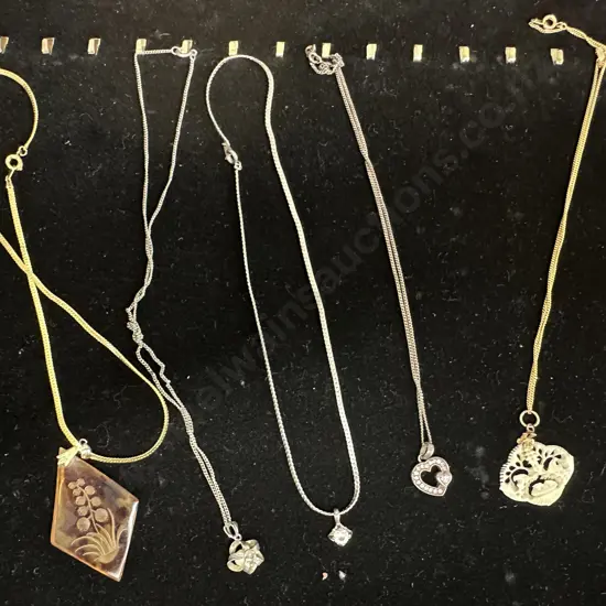 Assorted Costume Jewellery Necklaces On Black Display Stand