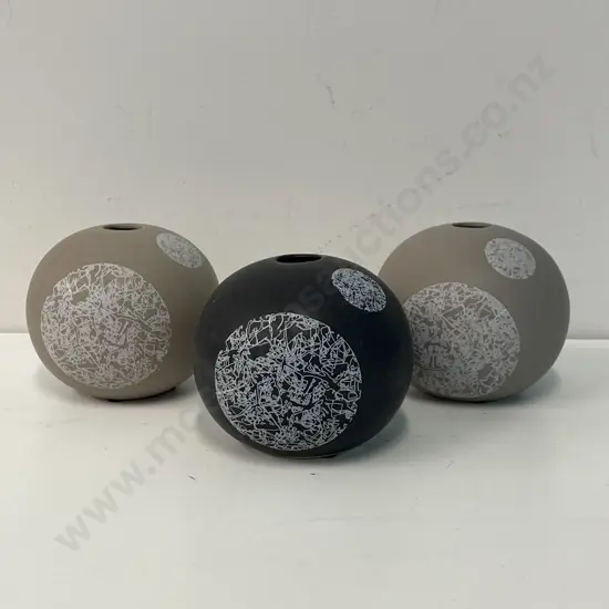 Three Modernist Sphere Shaped Vases: Two Sand coloured, one black