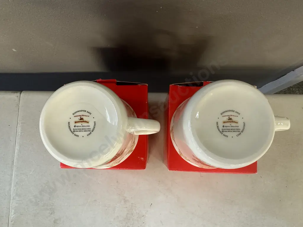 Pair Of Royal Doulton China Bunnykins Mugs Celebrating Their 75th Anniversary Image 1++