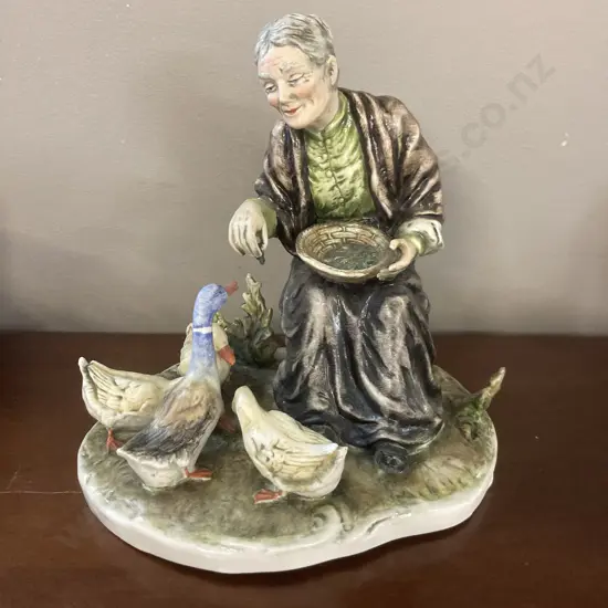 Capodimonte Old Woman Feeding Ducks Regis 627 Porcelain Figurine. 23 x 21cm