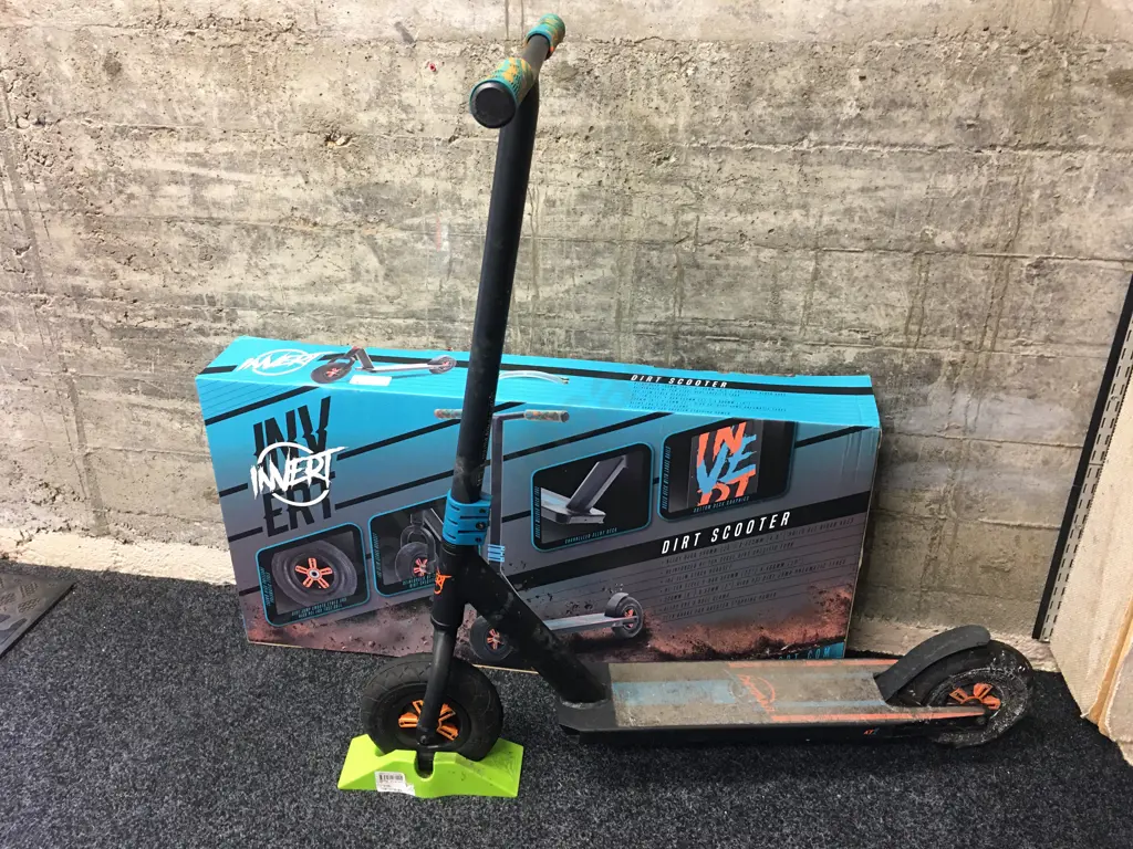 Invert Black & Teal Dirt Scooter With Mad Gear Scooter Stand Image 1++