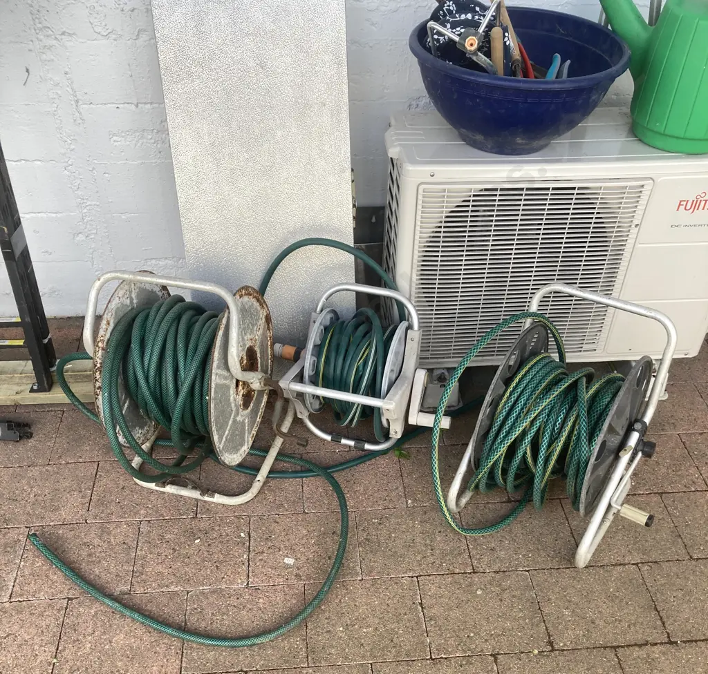 Three Garden Hose & Reels (As Found) Image 1++