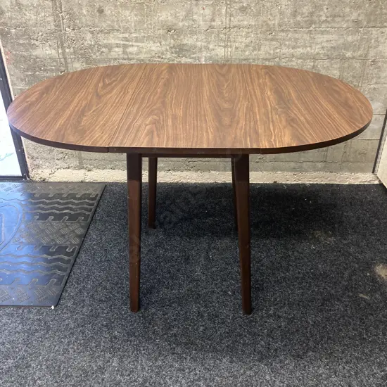 Mahogany Effect Oval Drop Leaf Table. H73 W79 D43/114cm