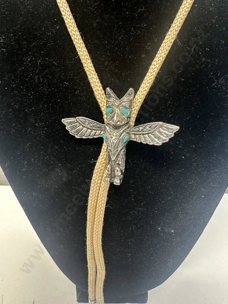 Vintage Metallic Thunderbird Totem Style Bolo Tie - Turquoise Colour Accents on Braided Cord & Matching Silver End Caps Image 1++