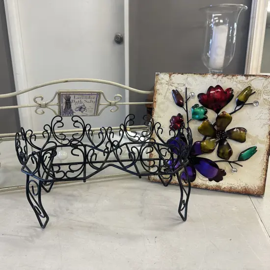 Cream Metal Wall Hung Shelf, Black Pot Plant Stand And Wall Art