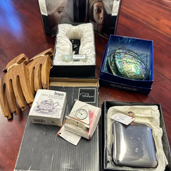 Boxed Items - NZ Paua Shell, Glass Koru, Philippi Bonded Leather Photo Frame, Hip Flask, With Wooden Salad Servers Etc