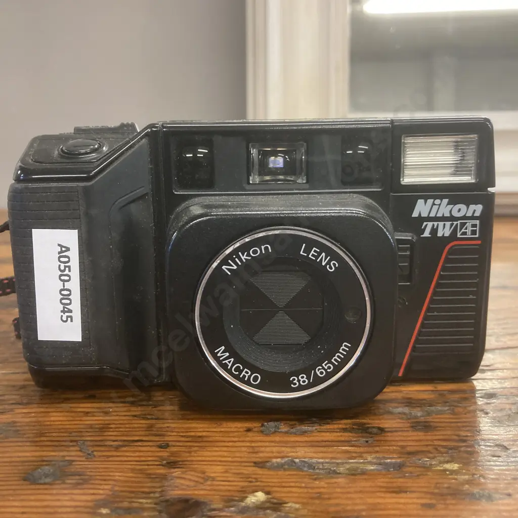 Nikon L35TWAF Camera (Tele.Touch) 1986 - Classic twin lens 35mm point-and-shoot featuring 38mm and 65mm focal lengths Image 1++