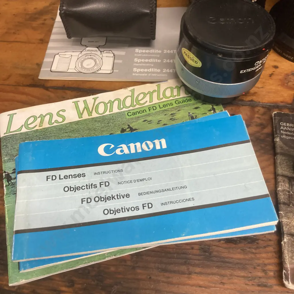 Canon T50 SLR Camera #2410225, FD Lenses - Zoom 35-105mm f/3.5, 24mm f/2.8,300mm f/5.6, 50mm f/1.8, 35-70mm f/3.5-4.5 Image 1++