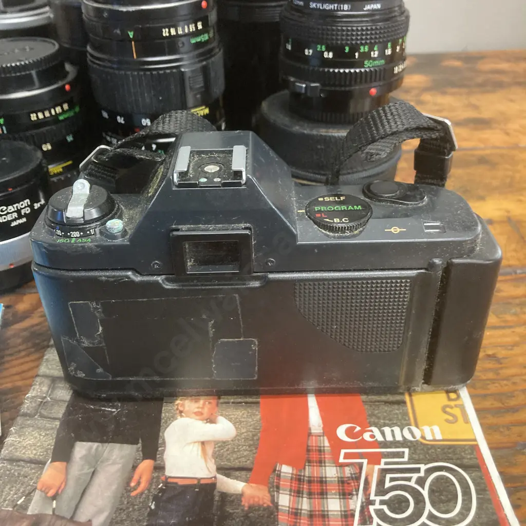Canon T50 SLR Camera #2410225, FD Lenses - Zoom 35-105mm f/3.5, 24mm f/2.8,300mm f/5.6, 50mm f/1.8, 35-70mm f/3.5-4.5 Image 1++