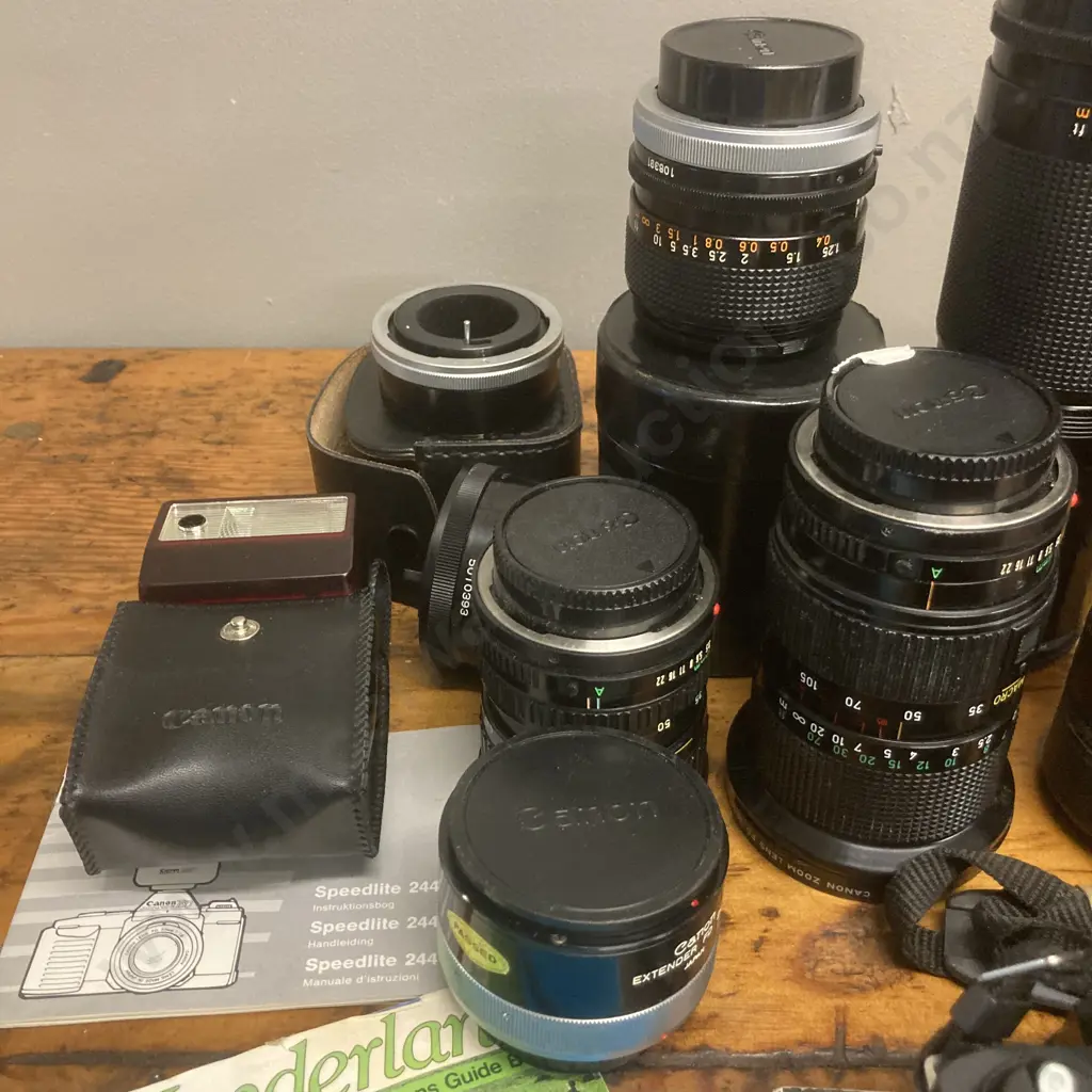 Canon T50 SLR Camera #2410225, FD Lenses - Zoom 35-105mm f/3.5, 24mm f/2.8,300mm f/5.6, 50mm f/1.8, 35-70mm f/3.5-4.5 Image 1++