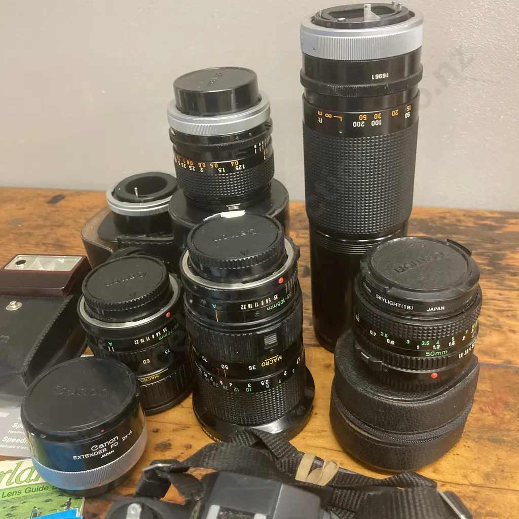 Canon T50 SLR Camera #2410225, FD Lenses - Zoom 35-105mm f/3.5, 24mm f/2.8,300mm f/5.6, 50mm f/1.8, 35-70mm f/3.5-4.5 Image 1++
