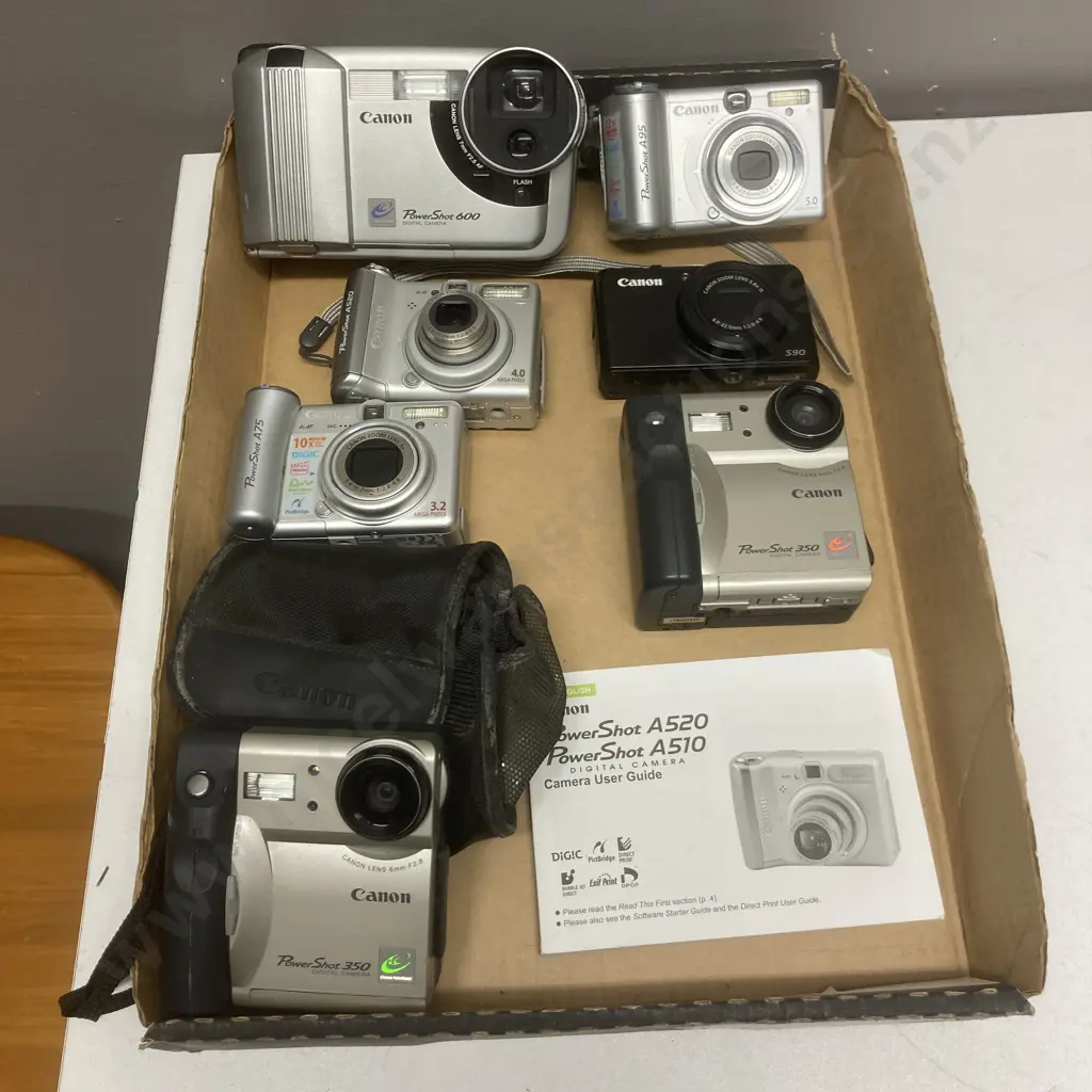 Lot of Seven Canon PowerShot Cameras Image 1++