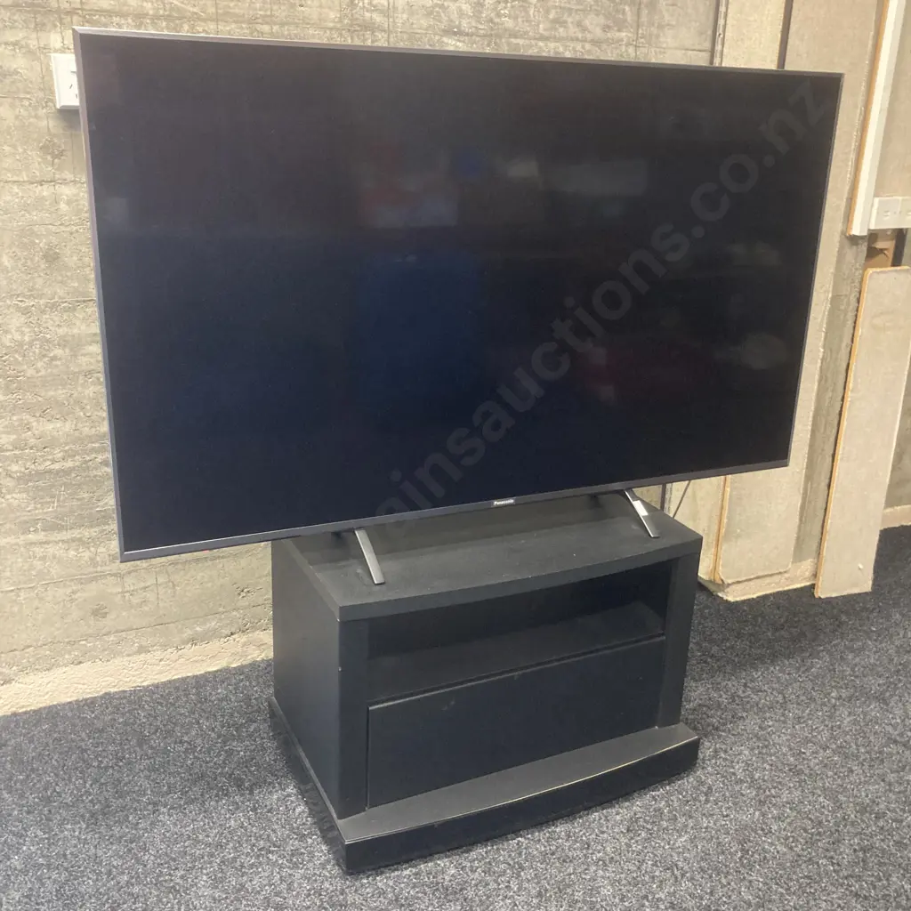 Panasonic 55" Premium 4K LED LCD TV TH-55GX850Z With Remote Control. Small Black TV Stand On Wheels With Drawer In Base Image 1++