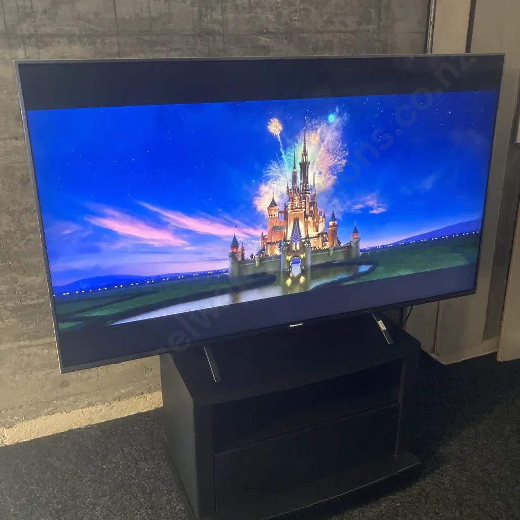 Panasonic 55" Premium 4K LED LCD TV TH-55GX850Z With Remote Control. Small Black TV Stand On Wheels With Drawer In Base Image 1++