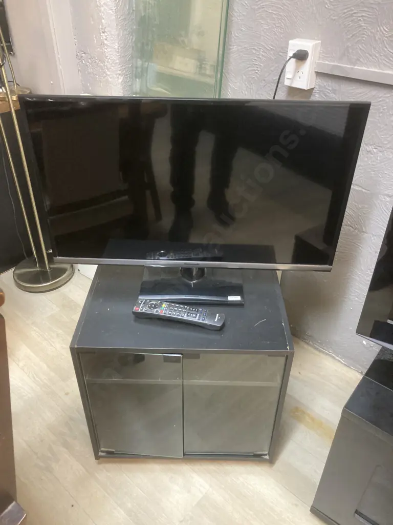 Panasonic 32" TV Model TH-32AS630Z Full HD Smart LED-LCD TV With Remote Control & Black Glass Double Door Cabinet Image 1++