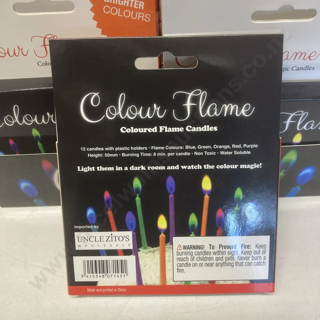 Box of 24 Colour Flame Candle 12 Packs Image 1++