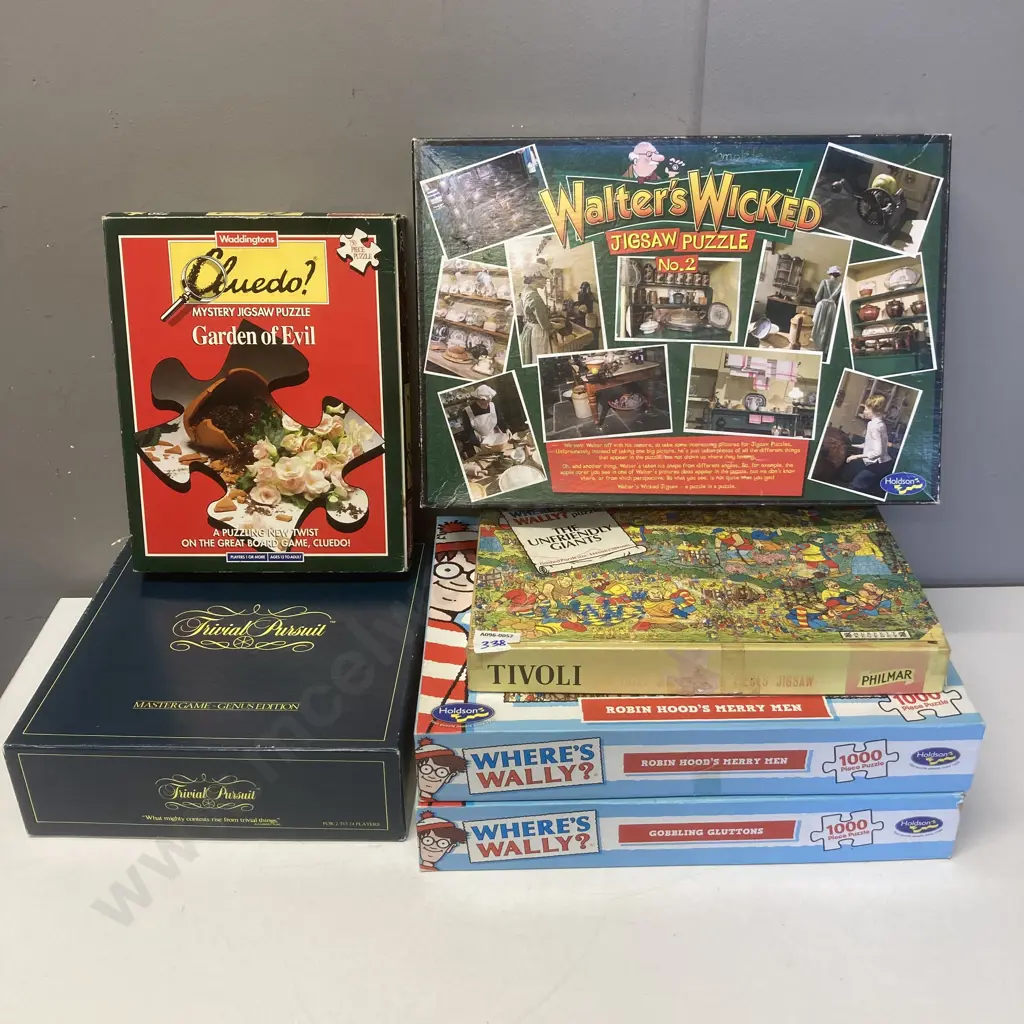 Where's Wally? Jigsaw Puzzles x 3, CLUEDO Garden Of Evil, Walters Wicked No 2, & Trivial Pursuit Mastergame Image 1++