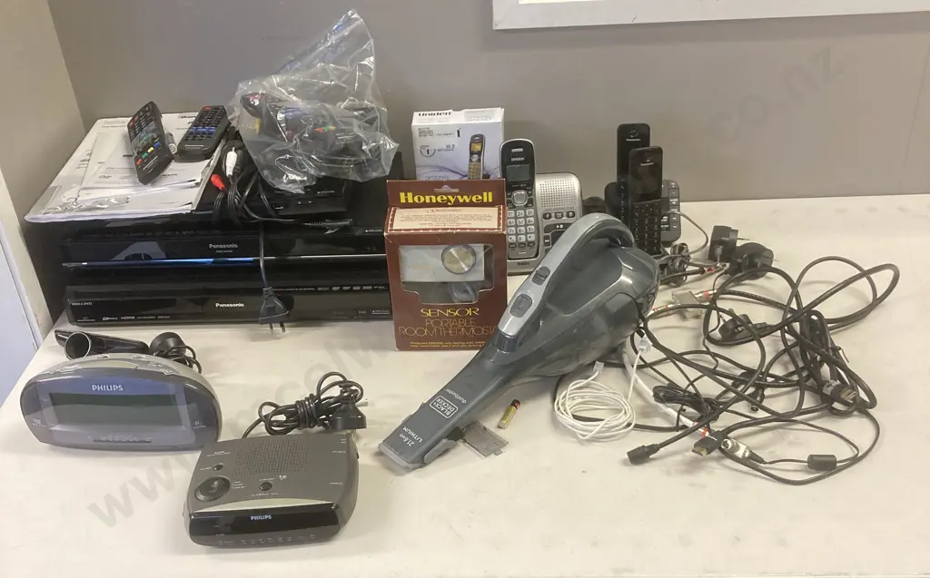 Box Lot Electronics, Phones, Etc ( Vacuum Has No Power Supply) Image 1++