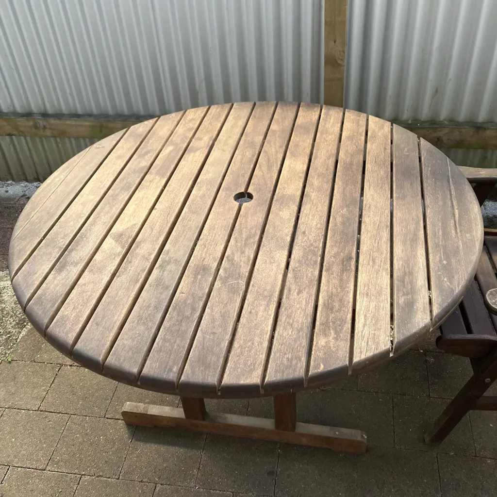 Icarus Collection Round Wooden Outdoor table (73 x 120cm) With Pair of Armed Wooden Chairs Image 1++