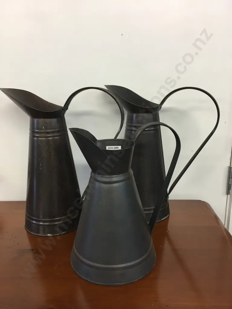 Three Metal Pitchers H34cm x 2 and H27cm Image 1++