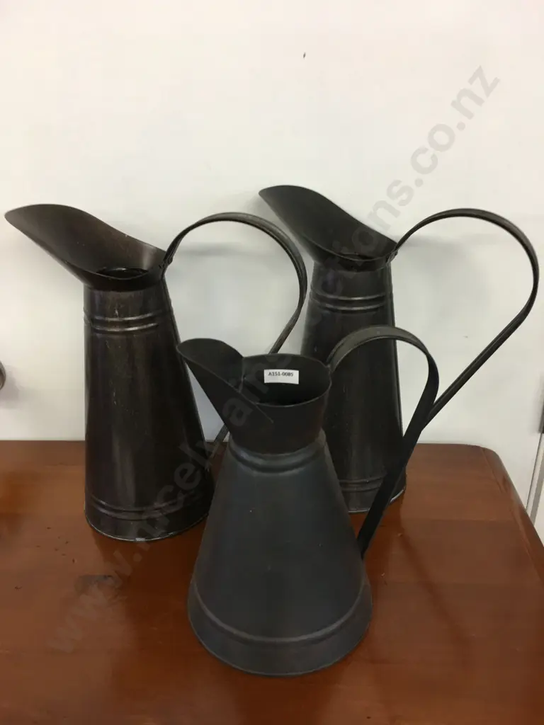 Three Metal Pitchers H34cm x 2 and H27cm Image 1++
