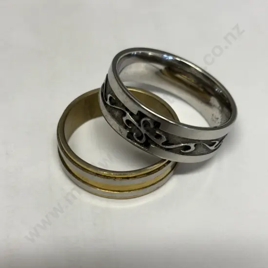 Gold and Silver coloured wedding band with large patterned silver coloured wedding band