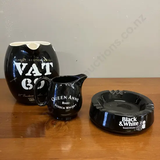 Three Vintage Wade Alcohol Advertsing Items: Vat69 Jug H15cm, Queen Anne Jug H8.5cm and Black and White Ashtray