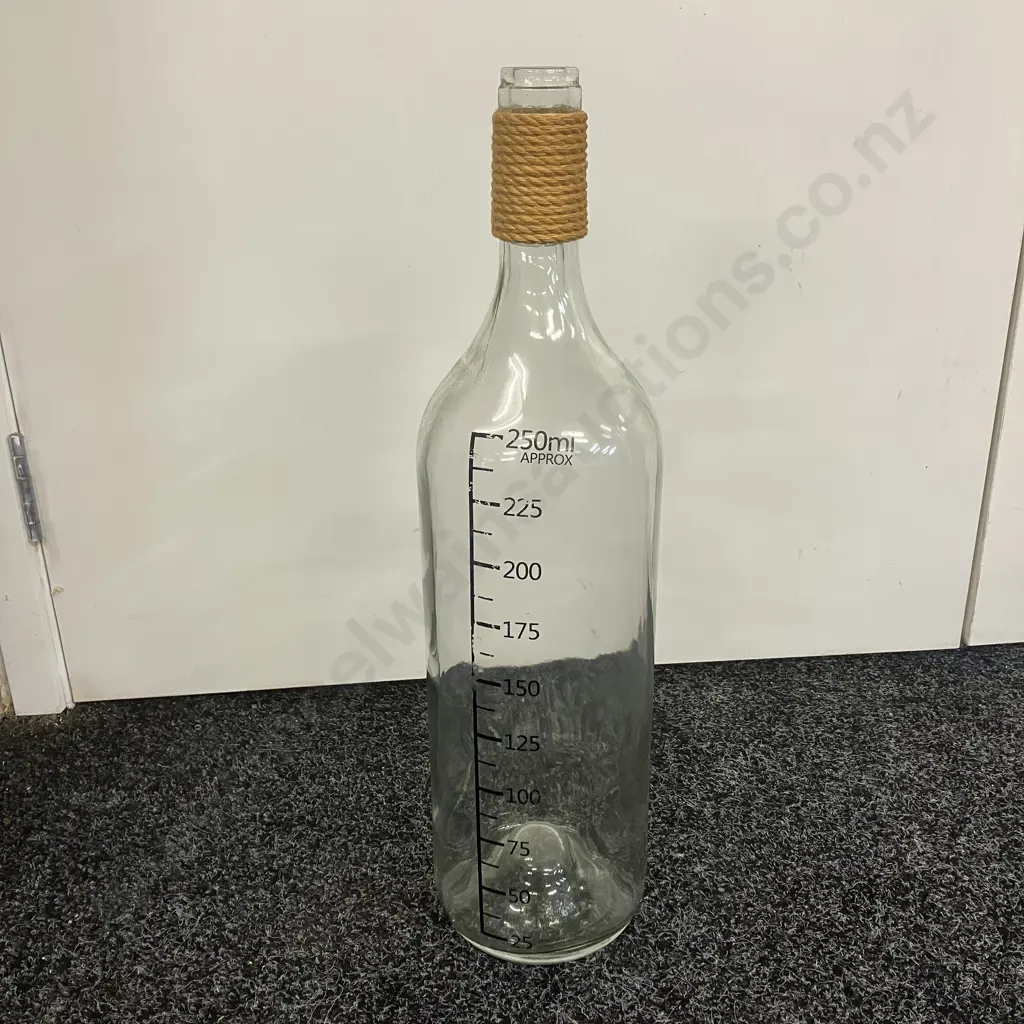 Large Glass Bottle With Raffia Around The Neck. 54 x 14cm Image 1++