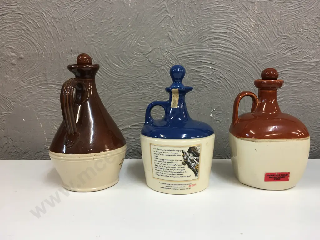 Selection Of Whiskey & Rum Stoneware Bottles Including Grand Parr, Cattos & Lambs Navy Rum Image 1++