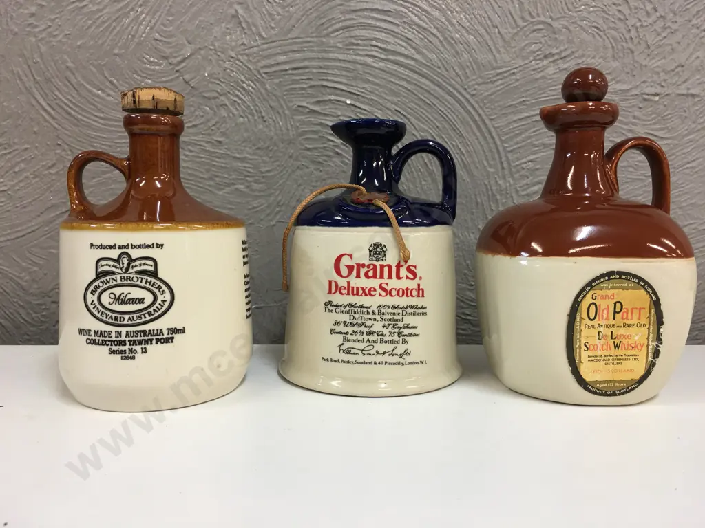Selection Of Whiskey & Port Stoneware Bottles Including Grand Parr, Grants & Brown Brothers Port Image 1++