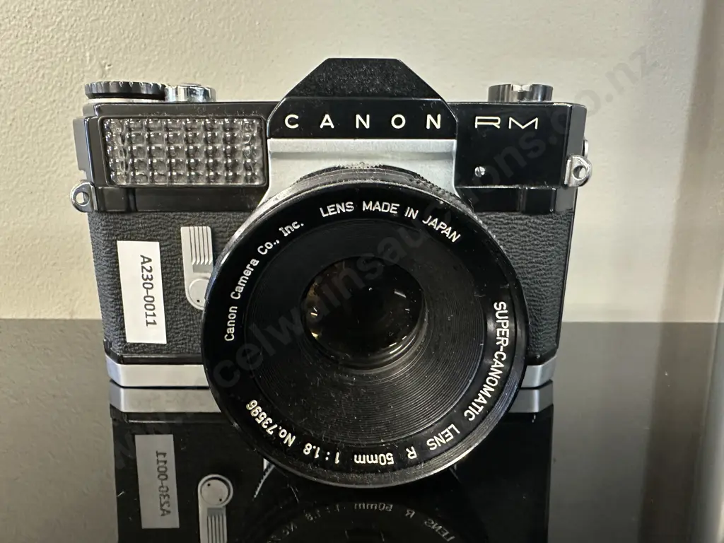 Canon Canonflex RM (#191539) 35mm SLR Camera with Super-Canomatic R 50mm f/1.8 Lens (#73596)- Japan 1962 Image 1++