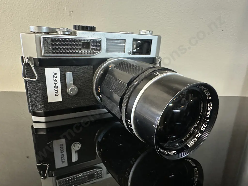 Canon Model 7 Camera (#933325) With Canon 135mm f3.5 Lens (#83575), LTM L39 Leica Screw Mount - Japan (1961) Image 1++