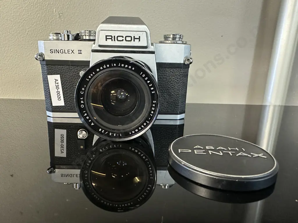 Ricoh Singlex II 35mm SLR Camera (#23 204199) with Asahi Opt. Co. Super-Takumar 28mm f3.5 Lens (#1054282) - Japan Image 1++
