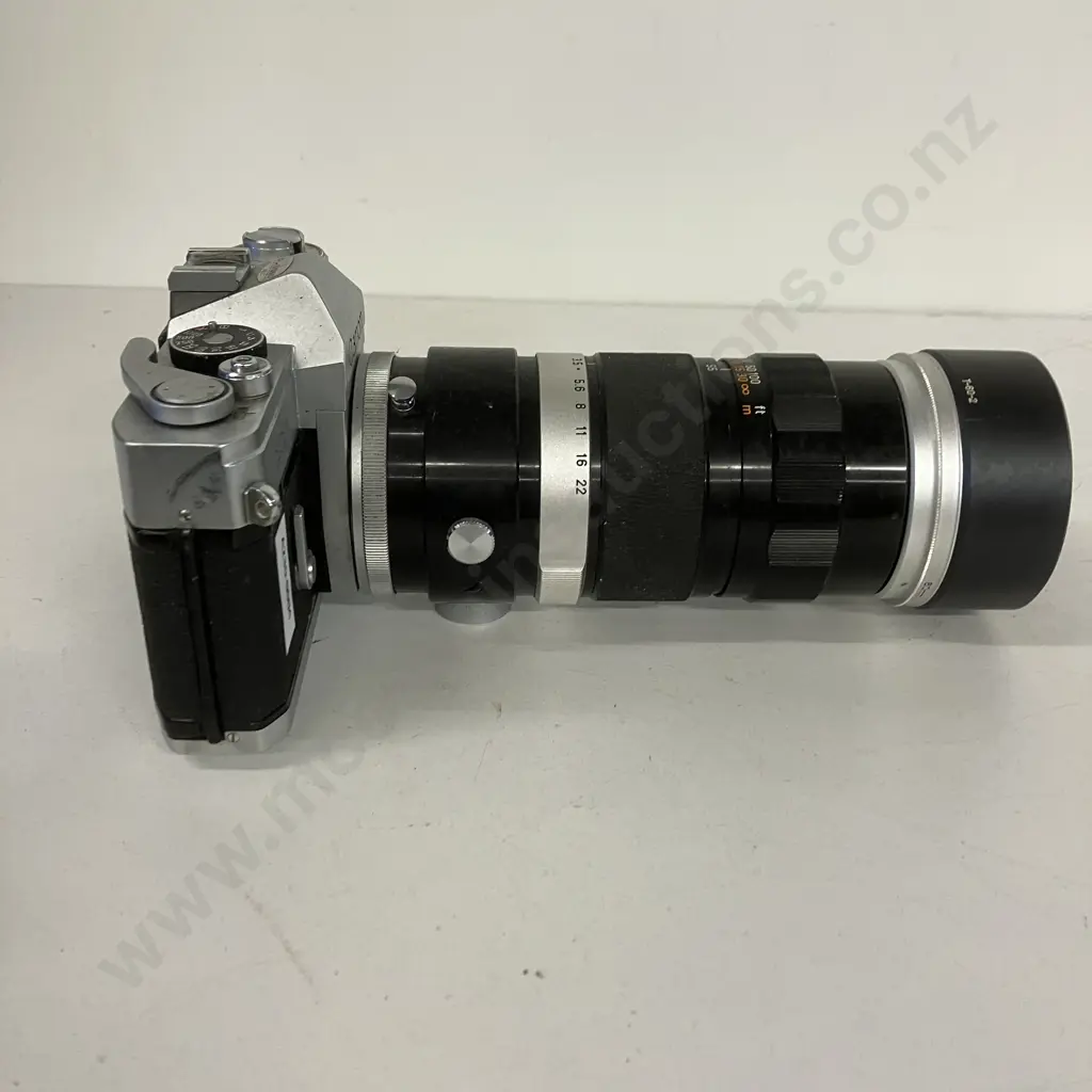 Canon FP Manual SLR (#136112) with Canon Zoom Lens FL 55-135mm f/3.5 (#14949) - 1964 Japan Image 1++