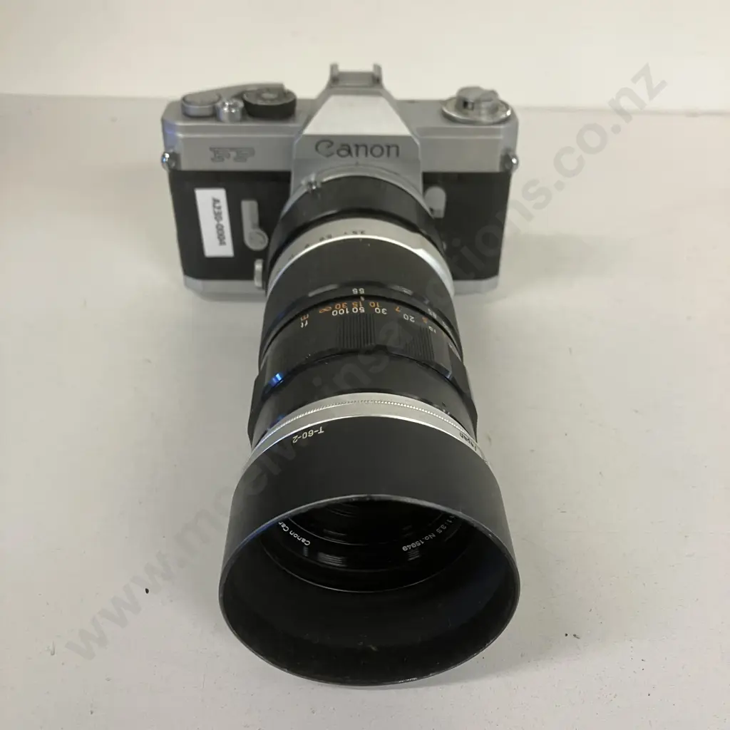 Canon FP Manual SLR (#136112) with Canon Zoom Lens FL 55-135mm f/3.5 (#14949) - 1964 Japan Image 1++
