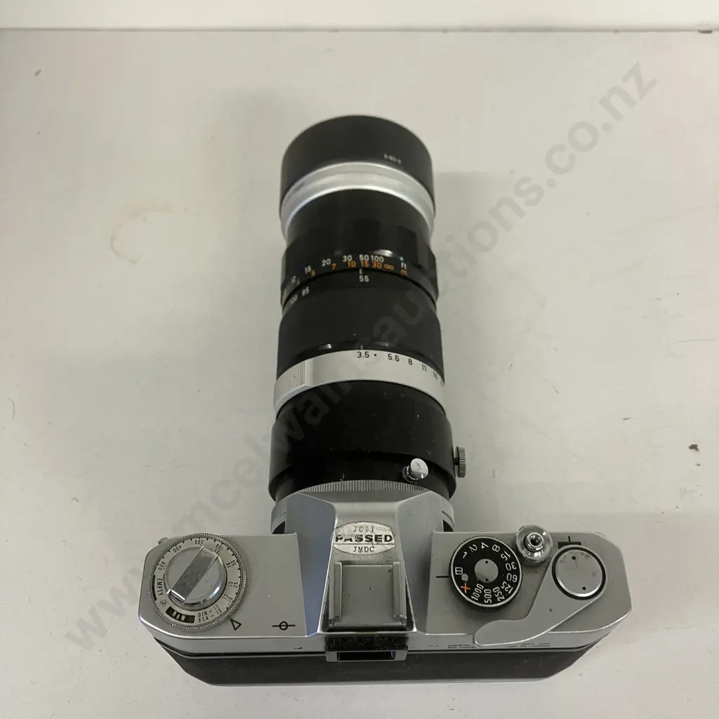 Canon FP Manual SLR (#136112) with Canon Zoom Lens FL 55-135mm f/3.5 (#14949) - 1964 Japan Image 1++