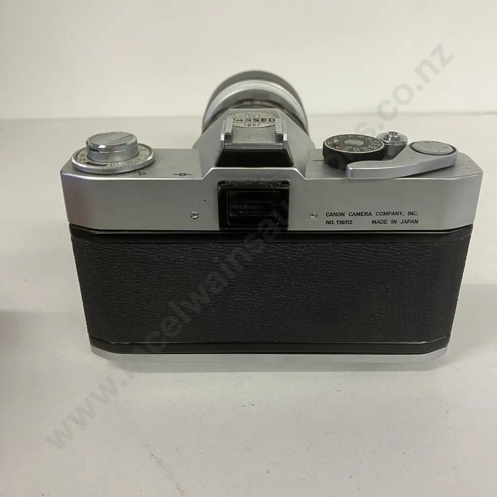 Canon FP Manual SLR (#136112) with Canon Zoom Lens FL 55-135mm f/3.5 (#14949) - 1964 Japan Image 1++