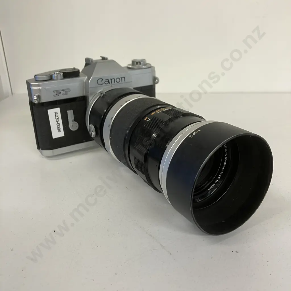 Canon FP Manual SLR (#136112) with Canon Zoom Lens FL 55-135mm f/3.5 (#14949) - 1964 Japan Image 1++