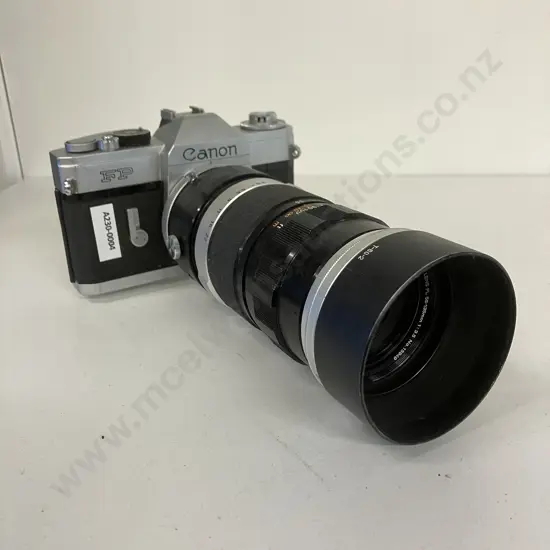 Canon FP Manual SLR (#136112) with Canon Zoom Lens FL 55-135mm f/3.5 (#14949) - 1964 Japan