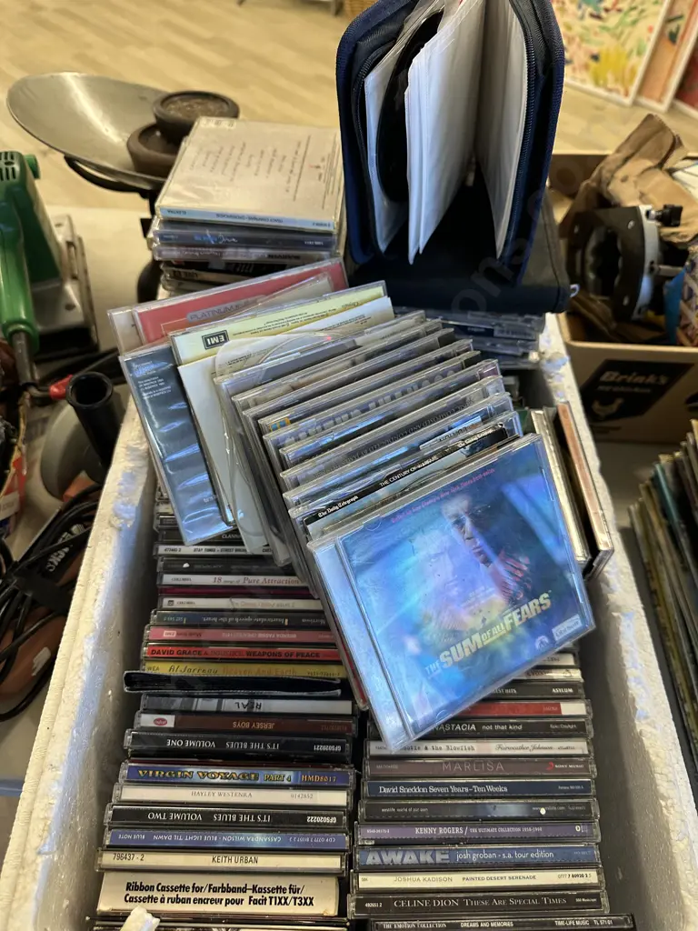 White Bin Of Assorted Cds & Cases Image 1++