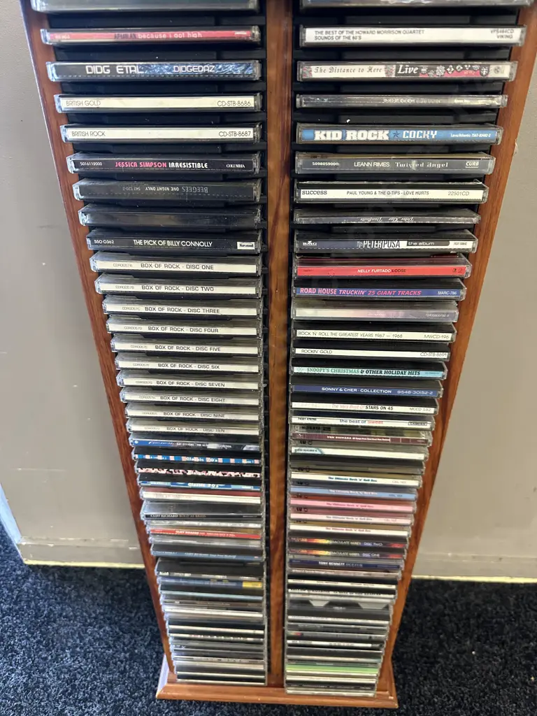 Wooden CD Rack With Assorted CDs Including Jessica Simpson, Box Of Rock Etc Image 1++
