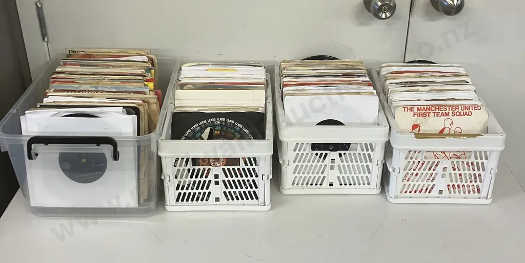 Assorted 45s / Single Vinyls - 4 Plastic Containers Of Image 1++