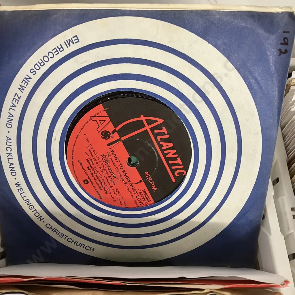 Assorted 45s / Single Vinyls - 4 Plastic Containers Of Image 1++