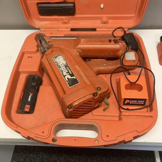 Paslode Impulse Nail Gun, Batteries, Charger In Moulded Case
