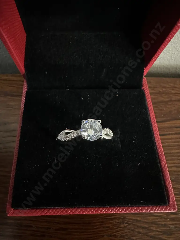 Ladies Ring Silver Coloured With Clear Stones In Red Case Image 1++