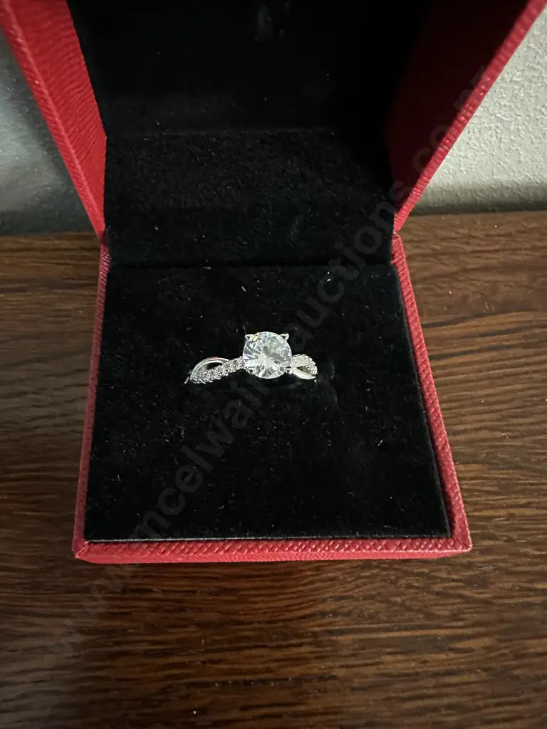 Ladies Ring Silver Coloured With Clear Stones In Red Case Image 1++